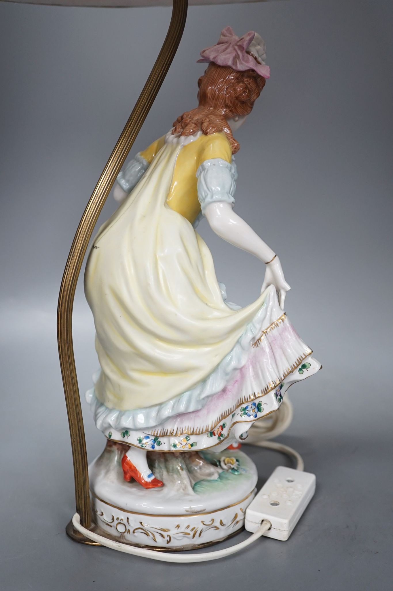 A German porcelain ‘dancing lady’ lamp